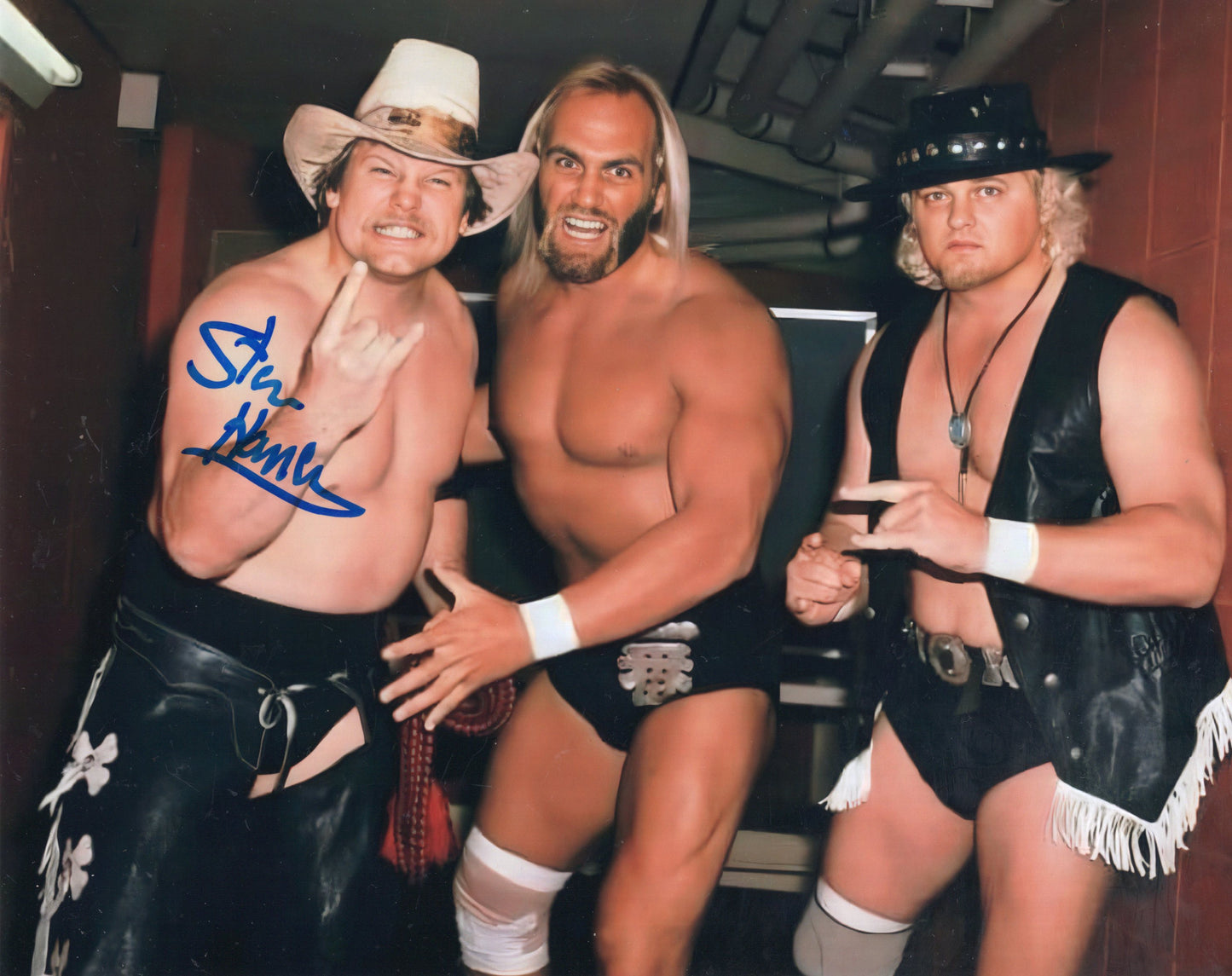 Stan Hansen (metallic 8x10 photo) NWA WCW signed auto autograph